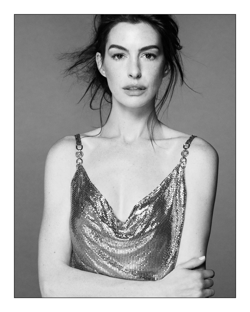 Stunning in black and white, Anne Hathaway fronts Versace Icons fall-winter 2024 ad.