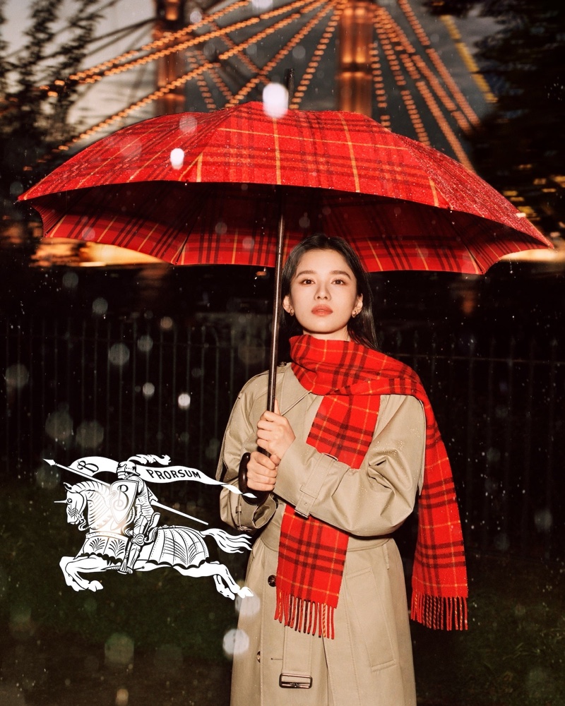 Zhang Jingyi wears an iconic trench in Burberry's 2024 outerwear campaign.