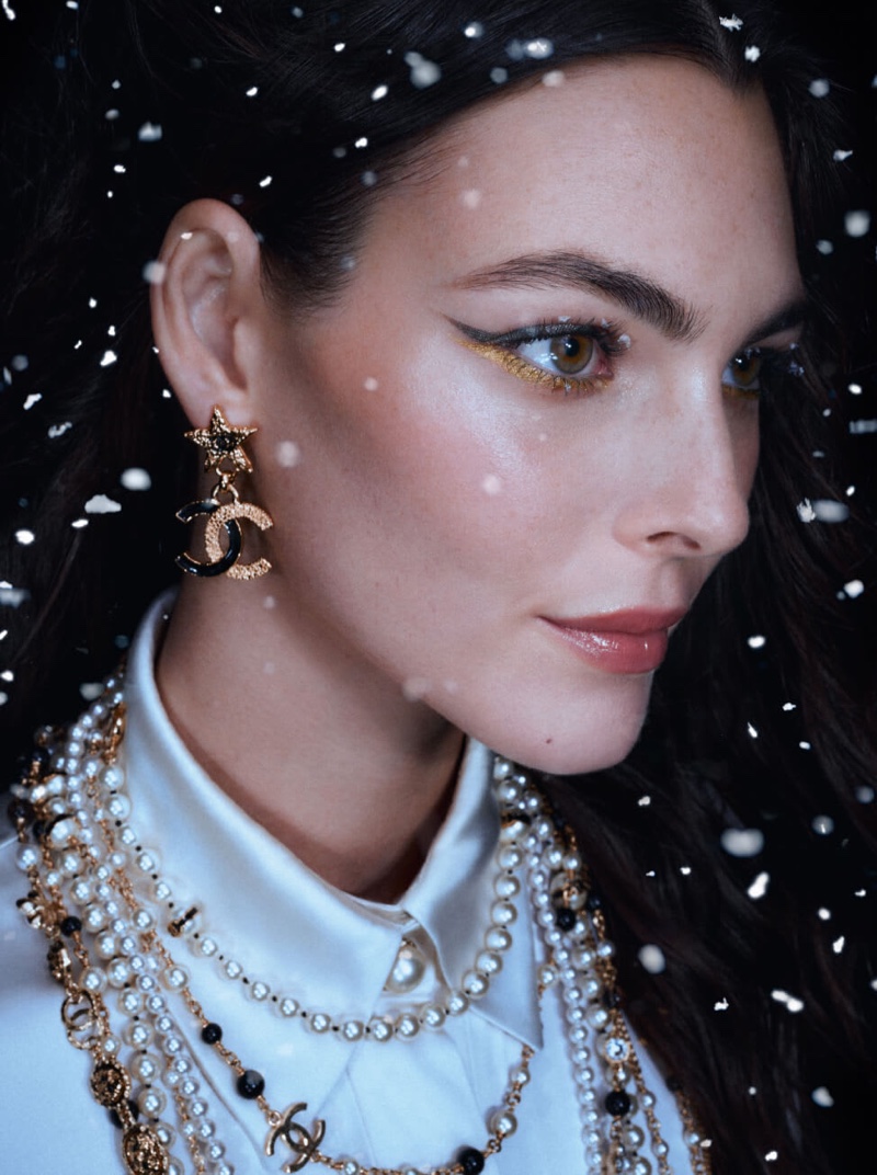 Vittoria Ceretti shows off Chanel Makeup's Holiday 2024 collection featuring winged eyeliner.