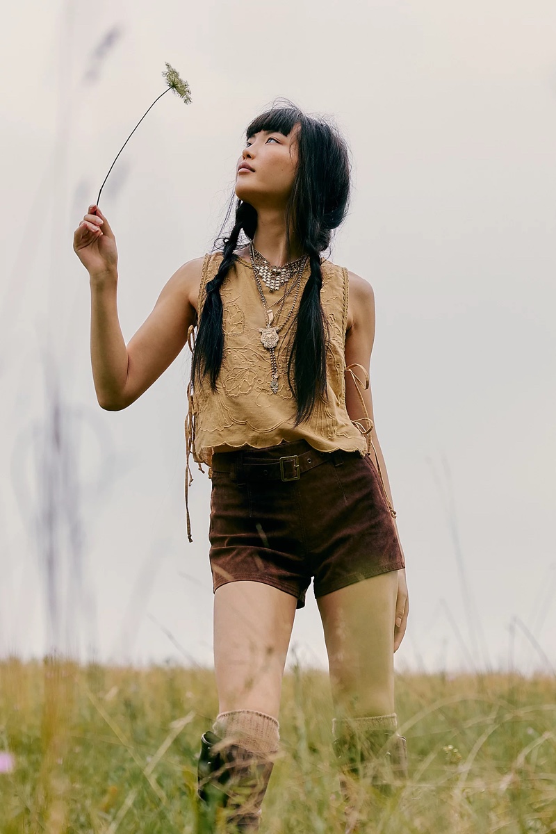 Free People spotlights the Faded Gardens tank and We The Free Jade suede micro shorts.