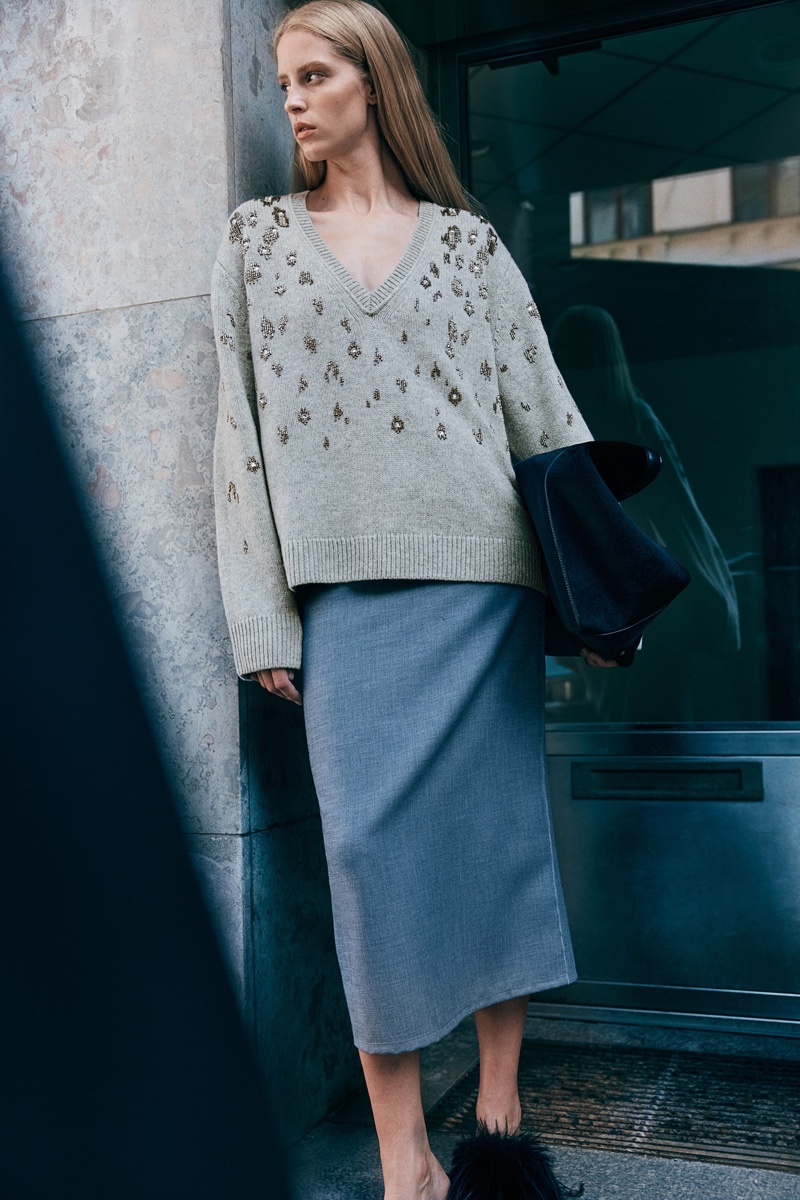 H&M embraces neutrals with a bead-embellished sweater and midi-length skirt for fall.