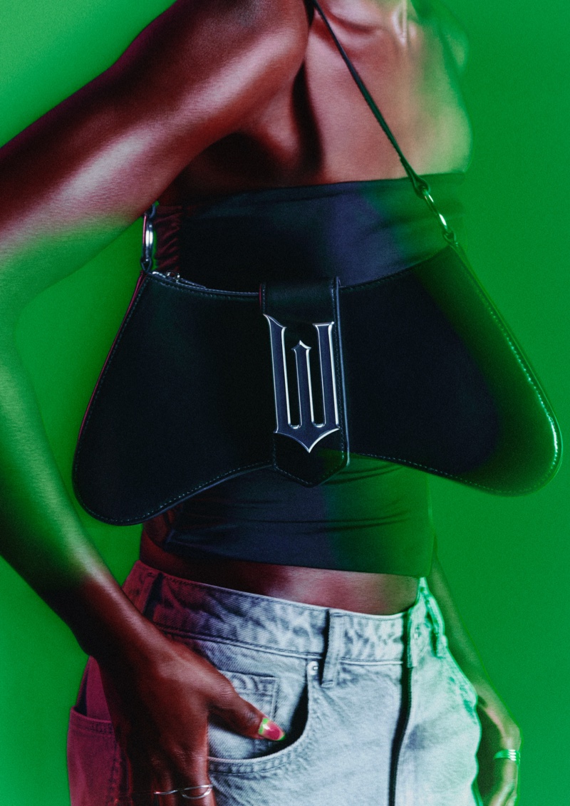 H&M's Wicked collection features a W-adorned curvy bag.