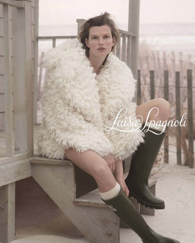 Luisa Spagnoli features a fluffy faux fur coat in its fall-winter 2024 ad.