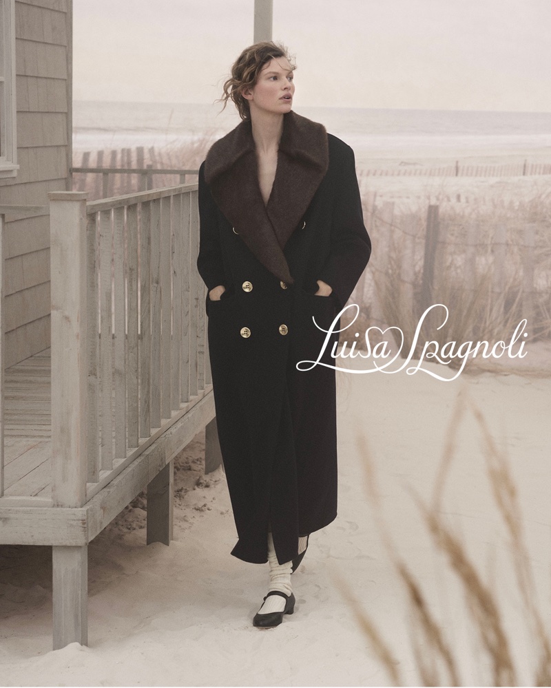 Bette Franke models a double-breasted coat in Luisa Spagnoli's fall 2024 ad.