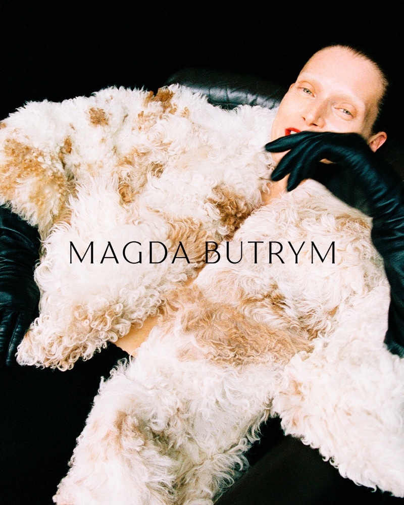 Modeling a luxe coat, Malgosia Bela is the face of Magda Butrym's 10th-anniversary line.