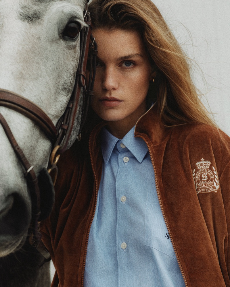 Posing with a horse, Luna Bijl fronts Sporty & Rich's Equestrian collection.