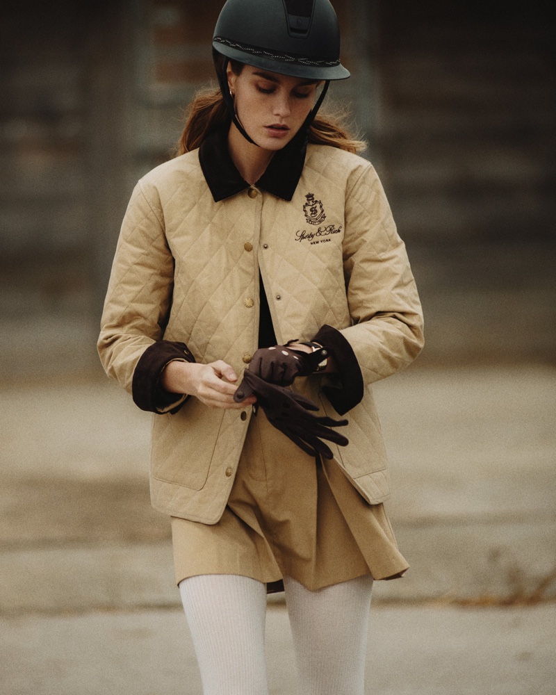 Luna Bijl models Sporty & Rich's quilted jacket and pleated skirt from its Equestrian Drop.