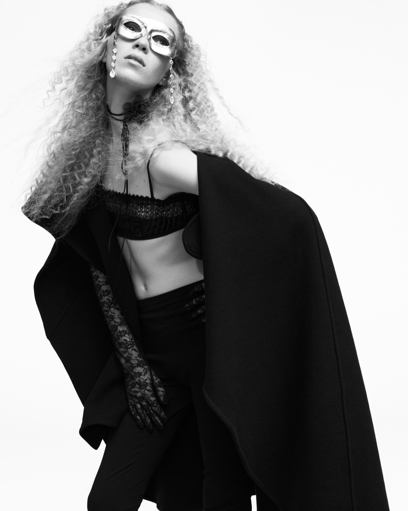 Zara channels vampire vibes with a wool-blend cape and mask Halloween look.