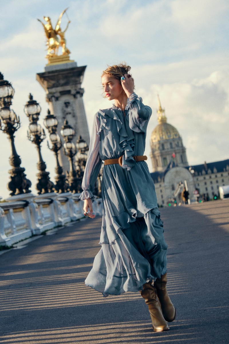 Zara gets carefree with a long belted dress.