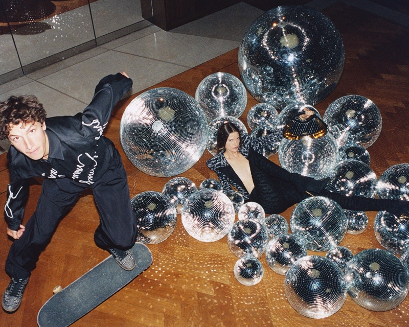 Balmain turns up the shine factor with disco balls for its resort 2025 campaign.