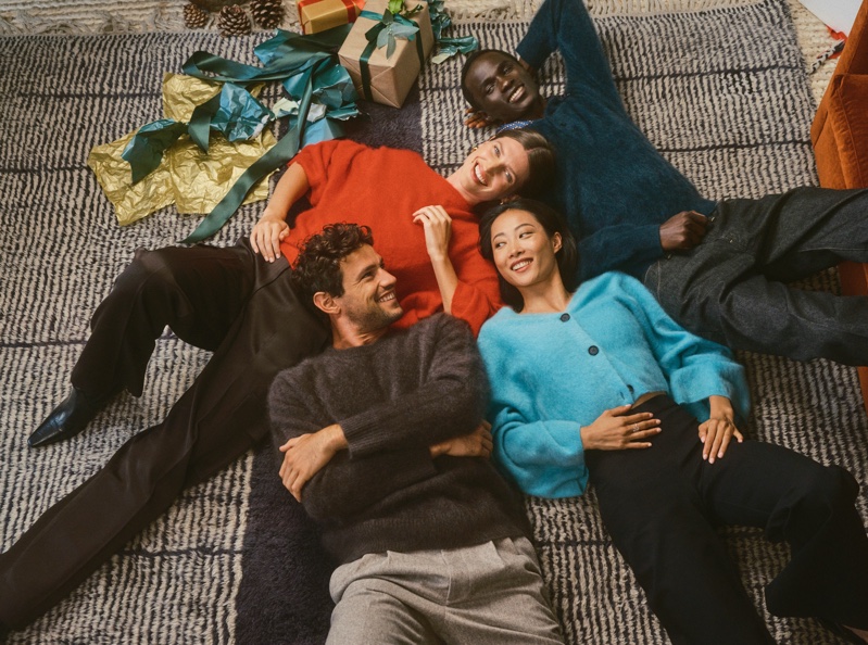 Banana Republic highlights colorful sweaters in its Holiday 2024 campaign.