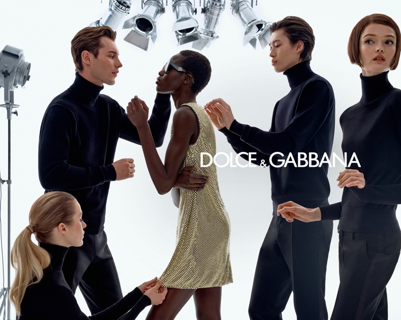 Awar Odhiang shines in a gold dress for Dolce & Gabbana's Holiday 2024 campaign.