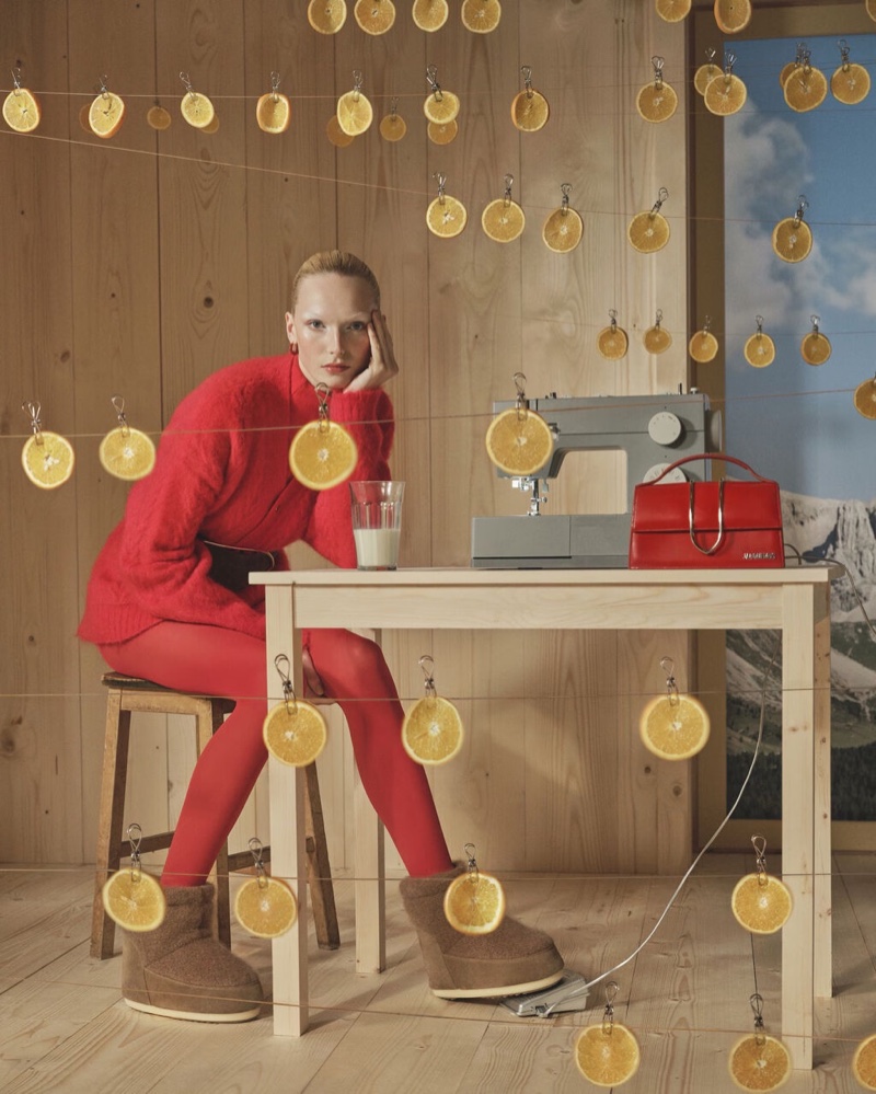 Jacquemus features a vibrant red ensemble in its Holiday 2024 Winter Retreat campaign.