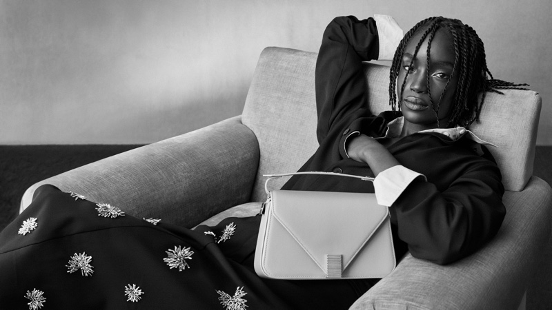 Maty Fall lounges in Lanvin's Character Studies 2024 campaign.