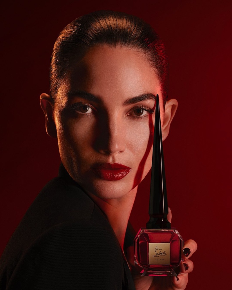 Louboutin debuts the Fétiche Le Cuir eau de parfum campaign.