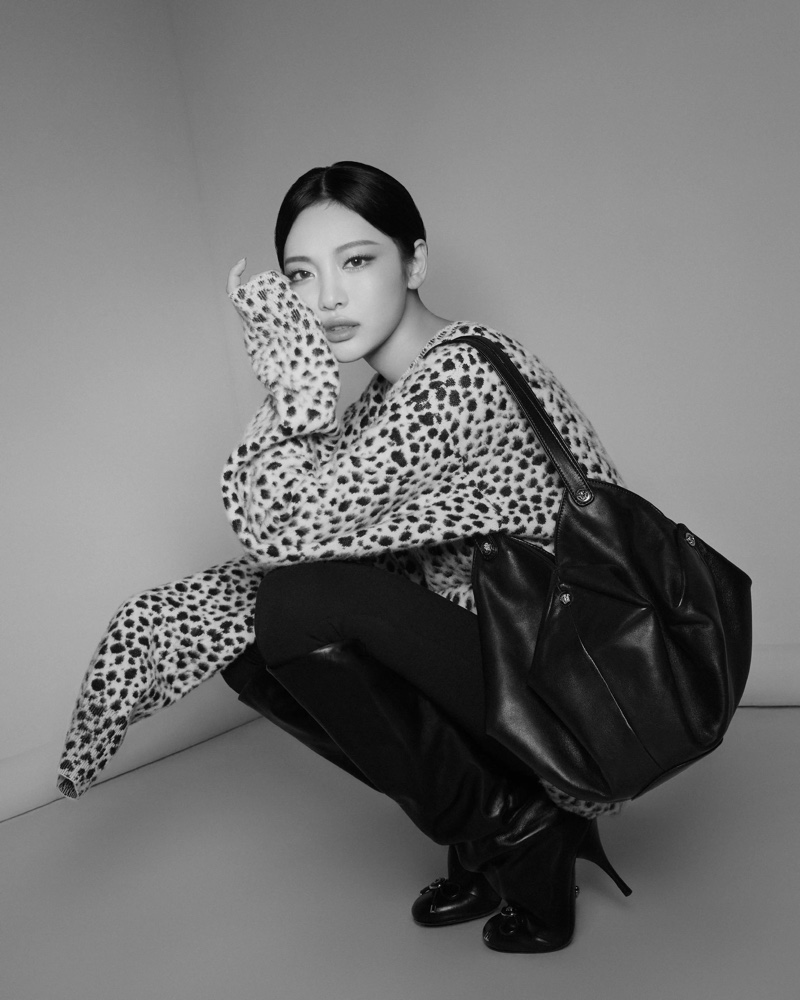 NINGNING shines in black and white for Versace's Holiday 2024 ad.