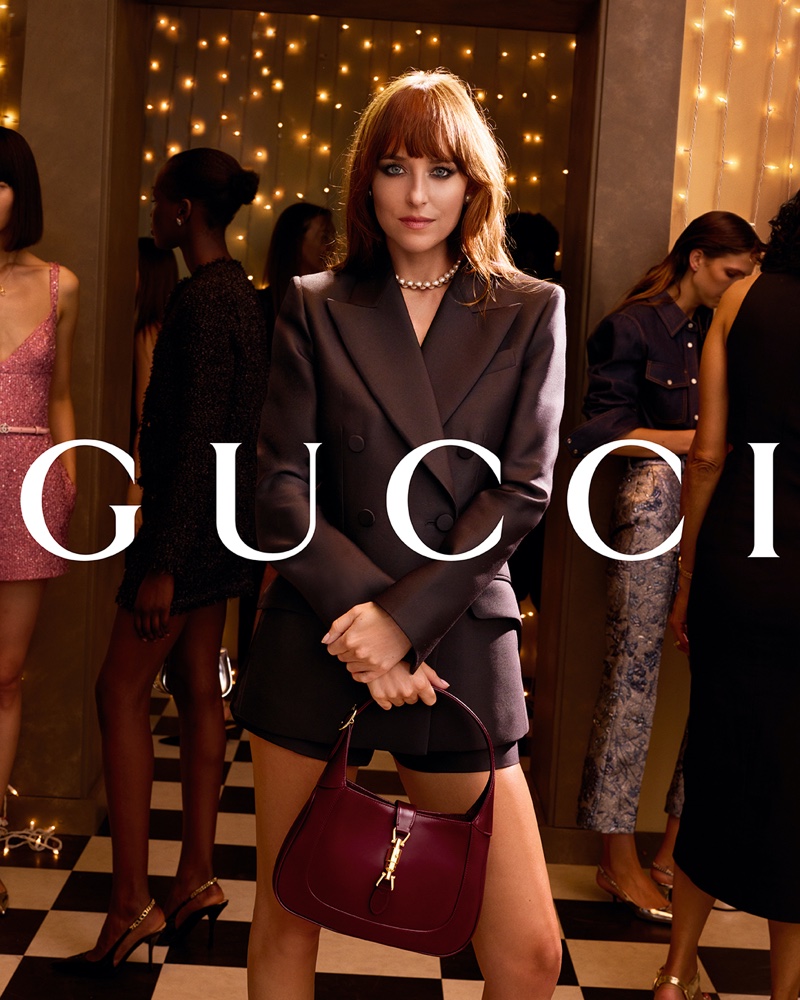 Actress Dakota Johnson wears a tailored look for the Gucci Gift: A Night in Florence campaign.