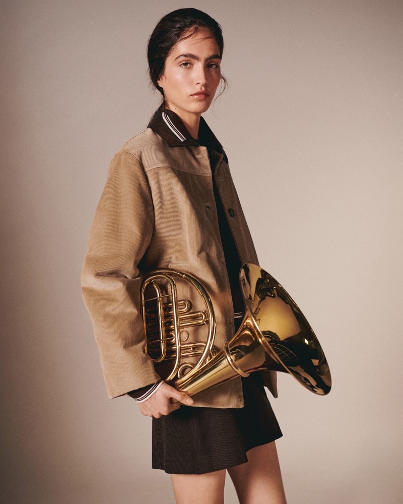 Sara Caballero wears a tan jacket for Massimo Dutti's New Characters editorial.