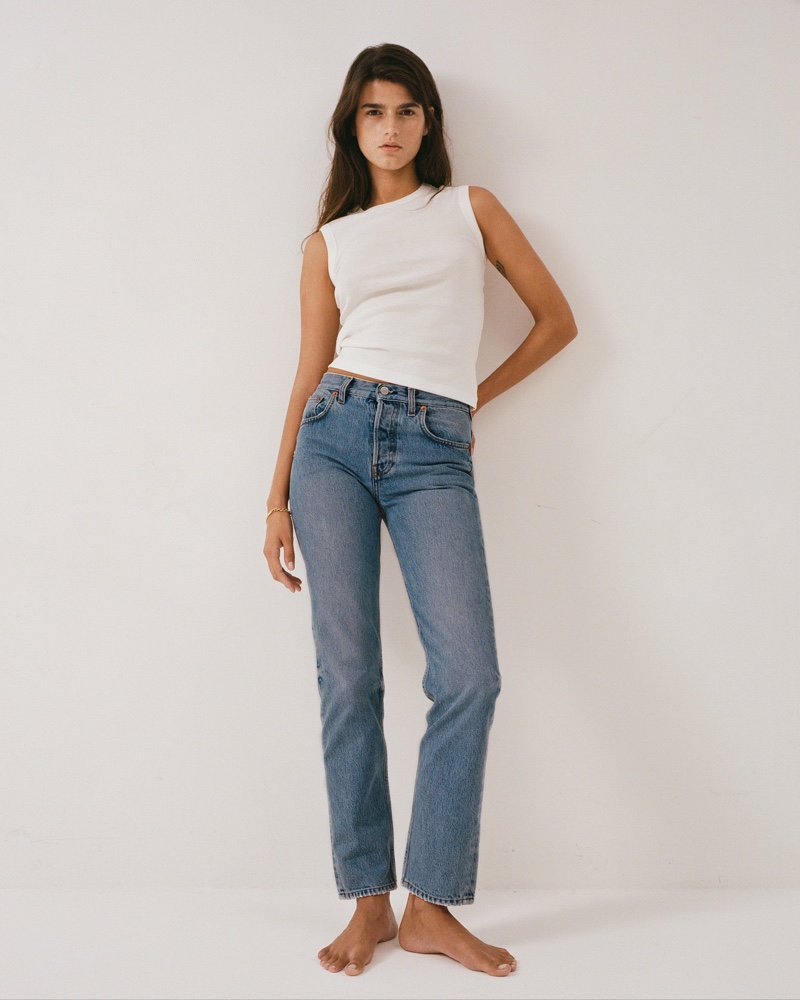 Paula Anguera models straight leg jeans from Sporty & Rich.