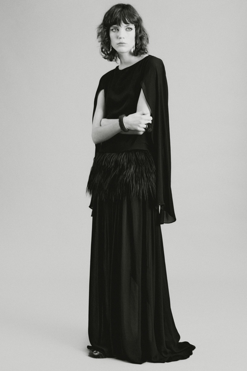 Zara gets glam with a faux fur sash-adorned dress.