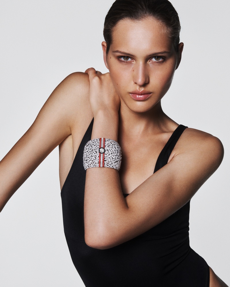 Angelina Kendall wears Chanel High Jewelry printed cuff from the Sport collection.