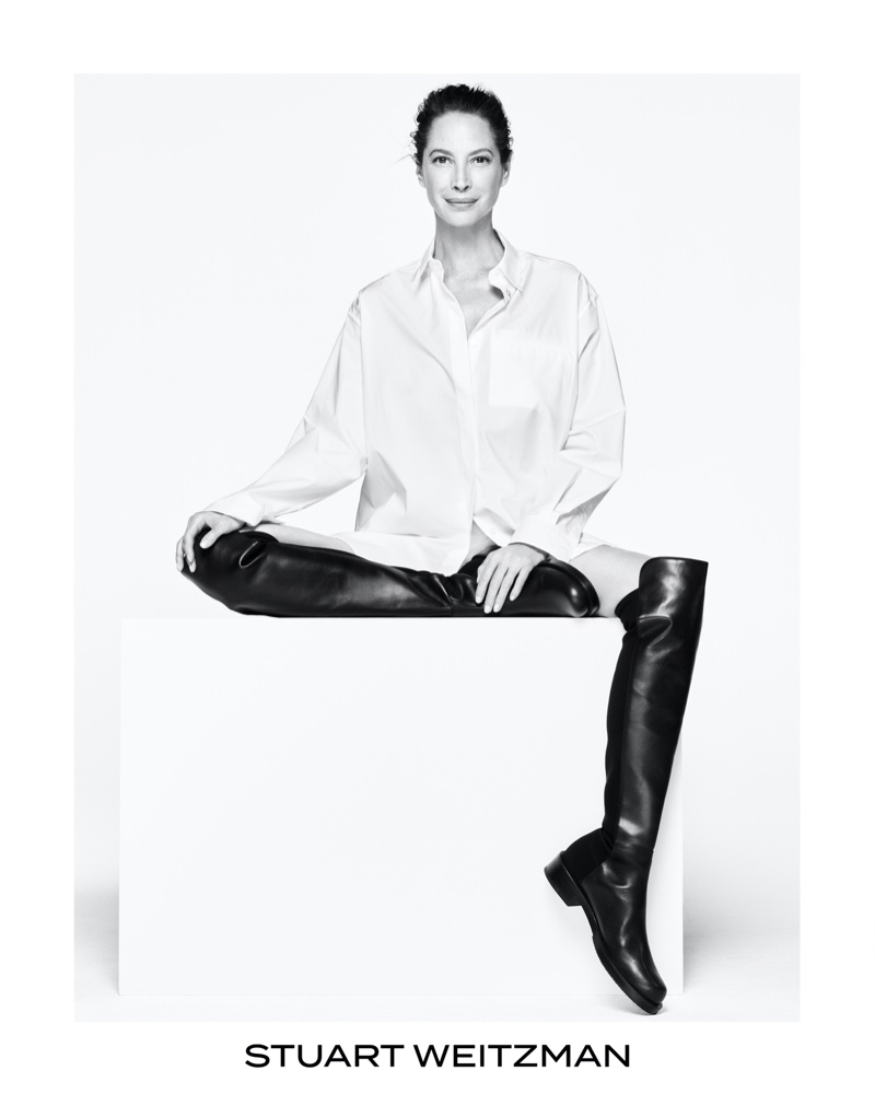 Supermodel Christy Turtington strikes a pose in Stuart Weitzman boots.