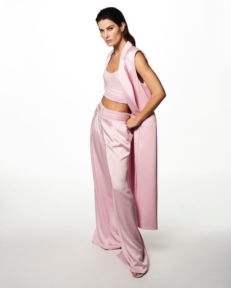 Isabeli Fontana looks pretty in pink for Genny's spring 2025 ad.