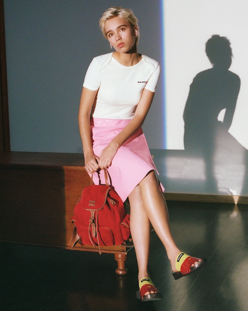 Lena Mantler looks pretty in pink for Miu Miu's spring 2025 campaign.