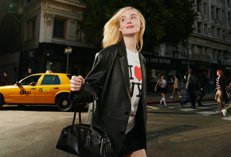 Walking New York City streets, Elle Fanning fronts Coach's spring 2025 ad.