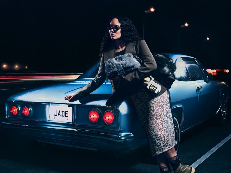 Jade Thirlwall poses next to a vintage car with Fendi's Mamma Baguette bag.