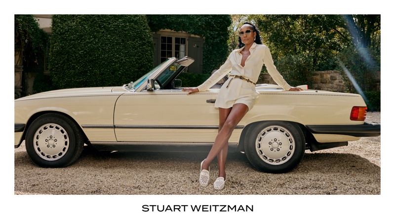 Issa Rae poses next to a convertible in Stuart Weitzman's spring 2025 campaign.