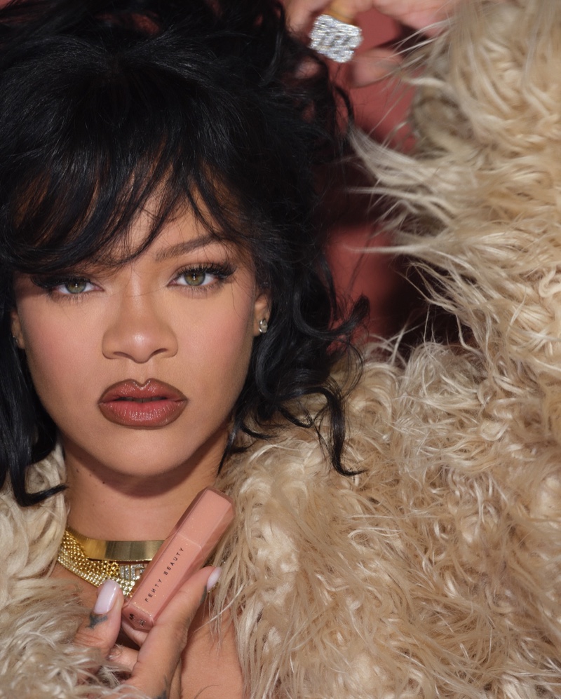 Rihanna fronts Fenty Beauty's Gloss Bomb Stix campaign.