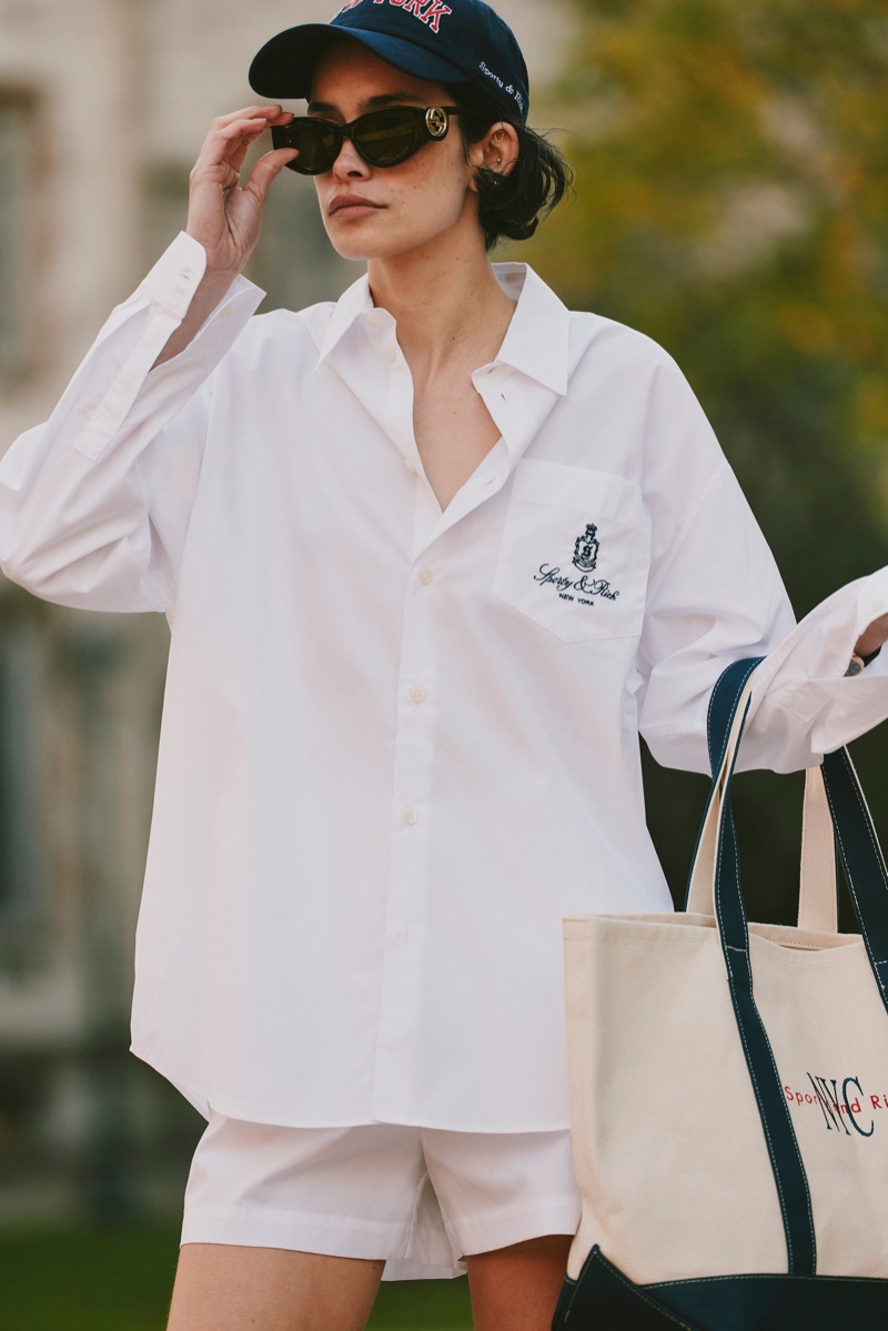 Sporty & Rich features a white overshirt in its 2025 Preppy Drop.